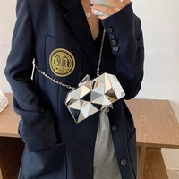 Turn Heads with the Confident Queen Gold Box Clutch 3